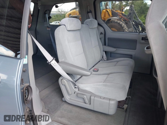 2004 Ford Freestar SES z VIN 2FMZA576X4BA05461, wystawiony jako IAAI lot #42255432 z przebiegiem 115 971 mil mil oraz . Historia ofert i sprzedaży dostępna na DreamBid. Obrazek 8.