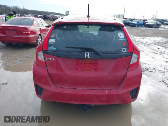 2015 Honda Fit LX z VIN 3HGGK5H54FM728448, wystawiony jako IAAI lot #41538650 z przebiegiem 115 450 mil mil oraz . Historia ofert i sprzedaży dostępna na DreamBid. Obrazek 16.