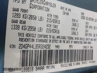 2005 Dodge Caravan SXT with VIN 2D4GP44L95R324232, listed as a IAAI auction lot 42056320 with 200,459 mi miles. Bid and sale history available at carsss.com. Image 9.