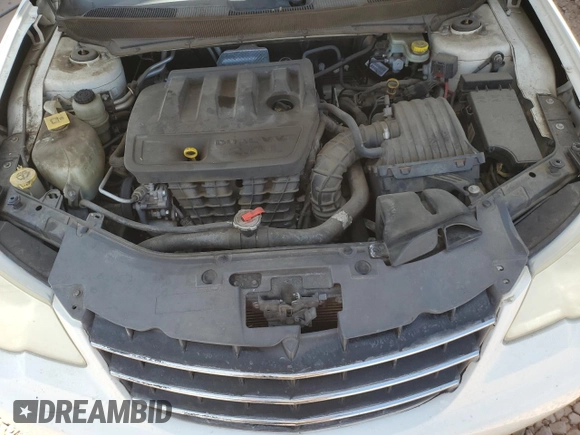 2007 Chrysler Sebring z VIN 1C3LC46K47N556611, wystawiony jako Copart lot #53664705 z przebiegiem 203 653 mil mil oraz Szkoda całkowita • Salvage title. Historia ofert i sprzedaży dostępna na DreamBid. Obrazek 11.