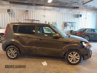 2012 Kia Soul + with VIN KNDJT2A64C7452975, listed as a IAAI auction lot 41635133 with 164,937 mi miles. Bid and sale history available at carsss.com. Image 13.