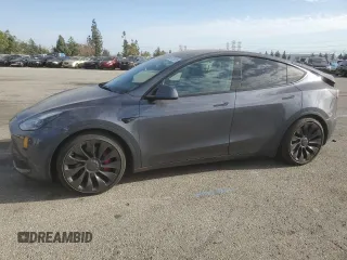 2022 Tesla Model Y Performance with VIN 7SAYGDEF3NF490643, listed as a Copart auction lot 46975825 with 50,792 mi miles and Salvage Title. Bid and sale history available at DreamBid. Image 1.
