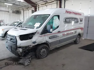 2020 Ford Transit Cargo z VIN 1FTBR1CG9LKB59461, wystawiony jako IAAI lot #41807469 z przebiegiem 205 431 mil mil oraz . Historia ofert i sprzedaży dostępna na DreamBid. Obrazek 21.