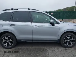 2014 Subaru Forester XT Touring with VIN JF2SJGMC1EH552474, listed as a IAAI auction lot 42461663 with 121,482 mi miles and . Bid and sale history available at DreamBid. Image 13.