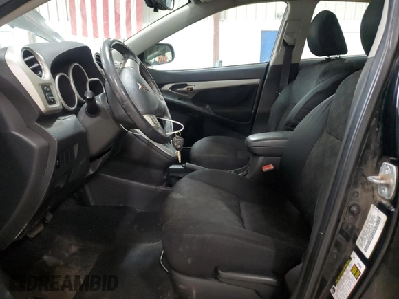 2009 Pontiac Vibe z VIN 5Y2SM67099Z410763, wystawiony jako Copart lot #57608015 z przebiegiem 172 308 mil mil oraz Tytuł czysty. Historia ofert i sprzedaży dostępna na DreamBid. Obrazek 7.