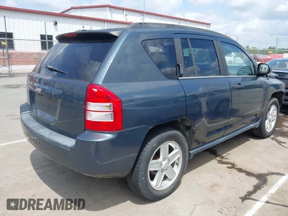 2007 Jeep Compass Sport with VIN 1J8FF47W17D597598, listed as a IAAI auction lot 42157027 with 153,043 mi miles and . Bid and sale history available at carsss.com. Image 4.