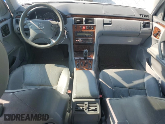 2001 Mercedes-Benz E-Class with VIN WDBJF65J11B272438, listed as a Copart auction lot 69214744 with 194,492 mi miles and Salvage Title. Bid and sale history available at carsss.com. Image 8.