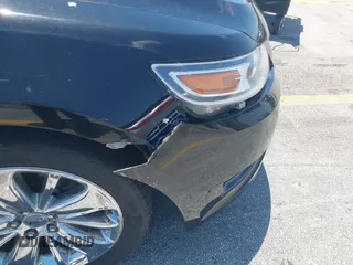 2010 Ford Taurus Limited with VIN 1FAHP2FW4AG151640, listed as a IAAI auction lot 42049305 with 135,769 mi miles. Bid and sale history available at carsss.com. Image 6.