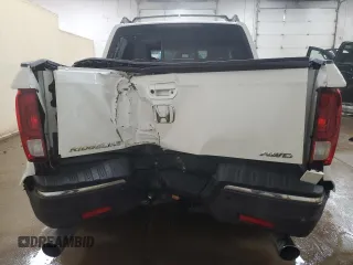 2018 Honda Ridgeline RTL-E with VIN 5FPYK3F74JB001049, listed as a Copart auction lot 57590075 with 111,848 mi miles and Clean title. Bid and sale history available at DreamBid. Image 6.