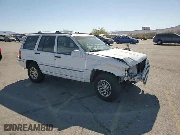 1995 Jeep Grand Cherokee Limited with VIN 1J4GZ78Y3SC701103, listed as a Copart auction lot 72038184 with 143,829 mi miles and Salvage Title. Bid and sale history available at carsss.com. Image 12.