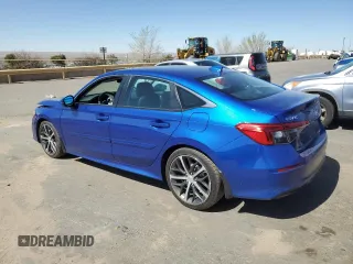 2023 Honda Civic Sedan Touring with VIN 2HGFE1F94PH306598, listed as a Copart auction lot 48559185 with 15,264 mi miles and Salvage Title. Bid and sale history available at carsss.com. Image 2.
