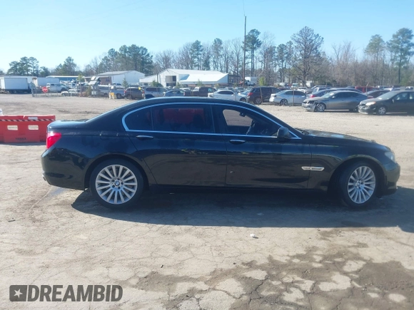 2011 BMW 7 Series 750Li xDrive with VIN WBAKC8C53BC433865, listed as a IAAI auction lot 41823357 with 122,476 mi miles. Bid and sale history available at carsss.com. Image 13.