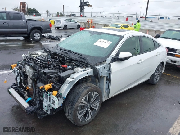 2018 Honda Civic Sedan EX-T with VIN JHMFC1F34JX001295, listed as a IAAI auction lot 41771014 with 122,927 mi miles. Bid and sale history available at carsss.com. Image 19.