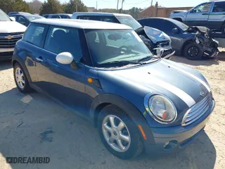 2009 MINI Cooper Hardtop with VIN WMWMF33549TW79871, listed as a IAAI auction lot 41844591 with 236,255 mi miles. Bid and sale history available at carsss.com. Image 1.