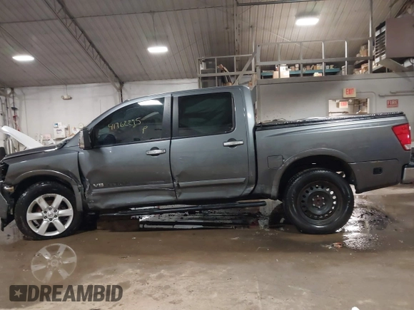 2014 Nissan Titan S with VIN 1N6AA0EC6EN513801, listed as a IAAI auction lot 41762295 with 128,412 mi miles and . Bid and sale history available at DreamBid. Image 14.