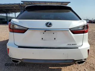 2016 Lexus RX 350 with VIN 2T2BZMCA5GC033906, listed as a Copart auction lot 64869445 with 129,861 mi miles and Salvage title. Bid and sale history available at DreamBid. Image 6.