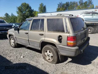 1995 Jeep Grand Cherokee Laredo with VIN 1J4FX58S1SC754691, listed as a Copart auction lot 72858214 with 251,234 mi miles and Salvage Title. Bid and sale history available at carsss.com. Image 2.