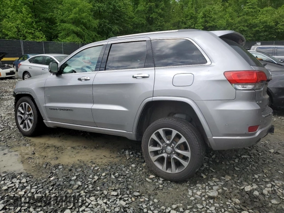 2018 Jeep Grand Cherokee Overland z VIN 1C4RJFCTXJC108624, wystawiony jako Copart lot #53738094 z przebiegiem 83 040 mil mil oraz . Historia ofert i sprzedaży dostępna na DreamBid. Obrazek 2.