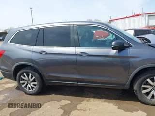 2019 Honda Pilot EX-L with VIN 5FNYF6H55KB082929, listed as a IAAI auction lot 42057611 with 93,532 mi miles and . Bid and sale history available at DreamBid. Image 13.