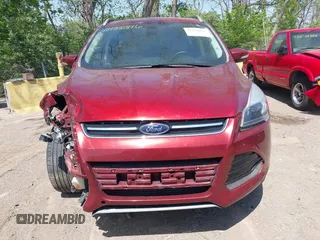 2015 Ford Escape Titanium with VIN 1FMCU0J92FUA38616, listed as a IAAI auction lot 42136816 with 131,941 mi miles and . Bid and sale history available at DreamBid. Image 12.