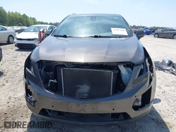 2019 Cadillac XT5 Luxury AWD z VIN 1GYKNDRS9KZ235687, wystawiony jako IAAI lot #41987360 z przebiegiem 78 784 mil mil oraz . Historia ofert i sprzedaży dostępna na DreamBid. Obrazek 13.