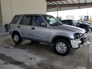 2001 Honda CR-V LX with VIN JHLRD28461C003132, listed as a Copart auction lot 51795695 with 133,027 mi miles and Salvage Title. Bid and sale history available at carsss.com. Image 4.
