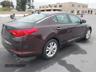 2013 Kia Optima LX z VIN 5XXGM4A72DG208410, wystawiony jako IAAI lot #42078867 z przebiegiem 89 033 mil mil oraz . Historia ofert i sprzedaży dostępna na DreamBid. Obrazek 4.