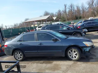 2003 Honda Accord EX z VIN 1HGCM66593A014065, wystawiony jako IAAI lot #41774694 z przebiegiem 163 536 mil mil oraz . Historia ofert i sprzedaży dostępna na DreamBid. Obrazek 14.