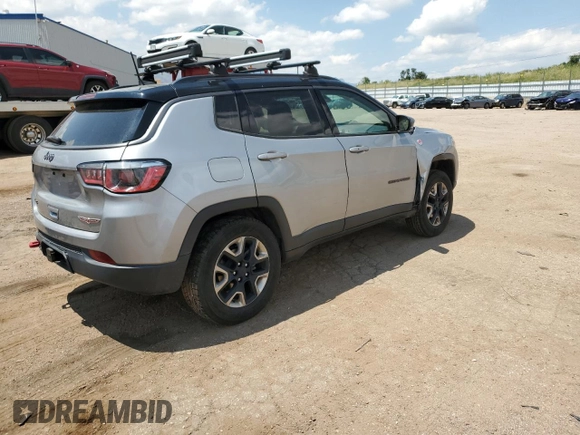 2017 Jeep Compass Trailhawk with VIN 3C4NJDDB1HT646751, listed as a Copart auction lot 62583555 with 99,974 mi miles and Salvage title. Bid and sale history available at DreamBid. Image 3.