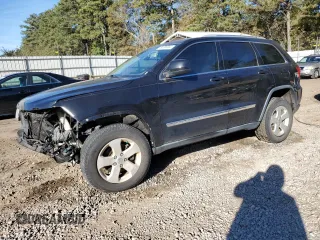 2013 Jeep Grand Cherokee Laredo with VIN 1C4RJEAT8DC533356, listed as a Copart auction lot 80200304 with 133,060 mi miles and Salvage Title. Bid and sale history available at carsss.com. Image 1.