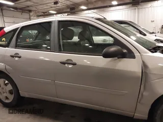 2007 Ford Focus S with VIN 1FAFP37NX7W330802, listed as a IAAI auction lot 41663895 with 147,015 mi miles and . Bid and sale history available at carsss.com. Image 14.