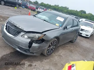 2013 Chrysler 200 Touring with VIN 1C3CCBBB4DN706903, listed as a IAAI auction lot 39901893 with 199,894 mi miles. Bid and sale history available at carsss.com. Image 2.