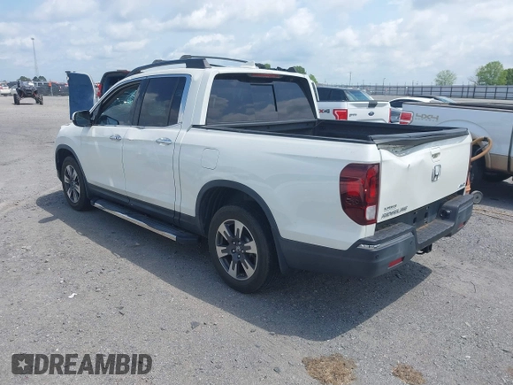 2019 Honda Ridgeline RTL-E with VIN 5FPYK3F77KB021667, listed as a IAAI auction lot 42115019 with 87,221 mi miles and . Bid and sale history available at DreamBid. Image 3.