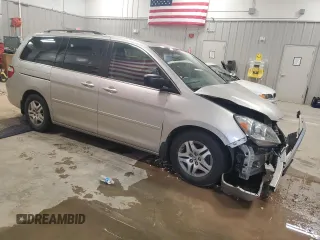 2006 Honda Odyssey EX-L z VIN 5FNRL38606B414740, wystawiony jako Copart lot #51861875 z przebiegiem 86 713 mil mil oraz Czysty tytuł • Clean title. Historia ofert i sprzedaży dostępna na DreamBid. Obrazek 4.