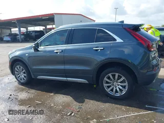 2021 Cadillac XT4 FWD Premium Luxury with VIN 1GYFZCR42MF007617, listed as a IAAI auction lot 42437974 with 126,071 mi miles and . Bid and sale history available at DreamBid. Image 14.