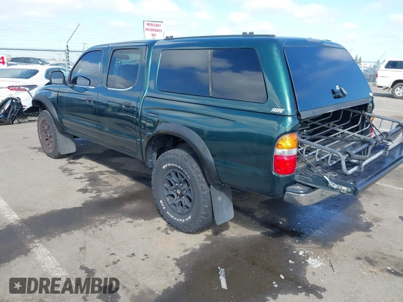 2001 Toyota Tacoma PreRunner with VIN 5TEGN92N91Z746705, listed as a IAAI auction lot 41947911 with 285,165 mi miles and . Bid and sale history available at DreamBid. Image 3.