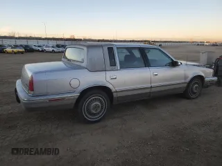 1993 Chrysler New Yorker z VIN 1C3XV66R3PD198654, wystawiony jako Copart lot #78900554 z przebiegiem 187 872 mil mil oraz Szkody całkowita. Historia ofert i sprzedaży dostępna na DreamBid. Obrazek 3.