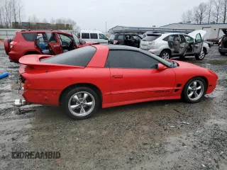 1998 Pontiac Firebird Formula z VIN 2G2FV22G4W2200991, wystawiony jako Copart lot #84553624 z przebiegiem 129 605 mil mil oraz Szkoda całkowita • Salvage title. Historia ofert i sprzedaży dostępna na DreamBid. Obrazek 3.