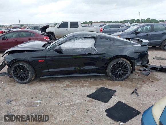 2020 Ford Mustang GT with VIN 1FA6P8CF8L5124454, listed as a IAAI auction lot 42133227 with 59,366 mi miles and . Bid and sale history available at DreamBid. Image 14.