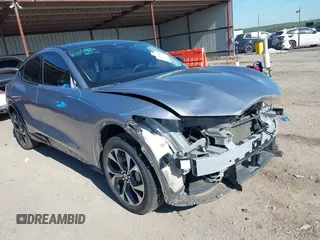 2021 Ford Mustang Mach-E Premium z VIN 3FMTK3SU7MMA02271, wystawiony jako IAAI lot #42072602 z przebiegiem 61 526 mil mil oraz . Historia ofert i sprzedaży dostępna na DreamBid. Obrazek 20.