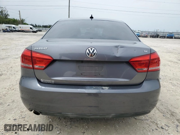 2012 Volkswagen Passat SE z VIN 1VWBP7A32CC063994, wystawiony jako Copart lot #59270995 z przebiegiem 169 999 mil mil oraz Szkoda całkowita • Salvage title. Historia ofert i sprzedaży dostępna na DreamBid. Obrazek 6.