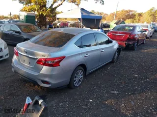 2019 Nissan Sentra S with VIN 3N1AB7AP7KY434155, listed as a IAAI auction lot 40653154 with 63,524 mi miles. Bid and sale history available at carsss.com. Image 4.