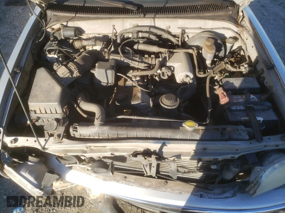 2004 Toyota Tacoma z VIN 5TEVL52N74Z390717, wystawiony jako Copart lot #45209015 z przebiegiem 187 005 mil mil oraz Szkoda całkowita • Salvage title. Historia ofert i sprzedaży dostępna na DreamBid. Obrazek 11.