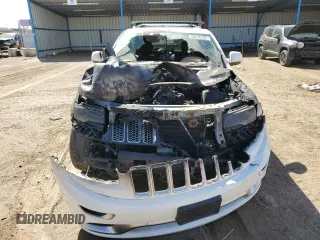 2015 Jeep Grand Cherokee Summit с VIN 1C4RJFJT5FC796820, выставлен на аукционе Copart как лот 49226795 с пробегом Не указан миль и Списание • Salvage title. История ставок и продаж доступна на DreamBid. Изображение 5.