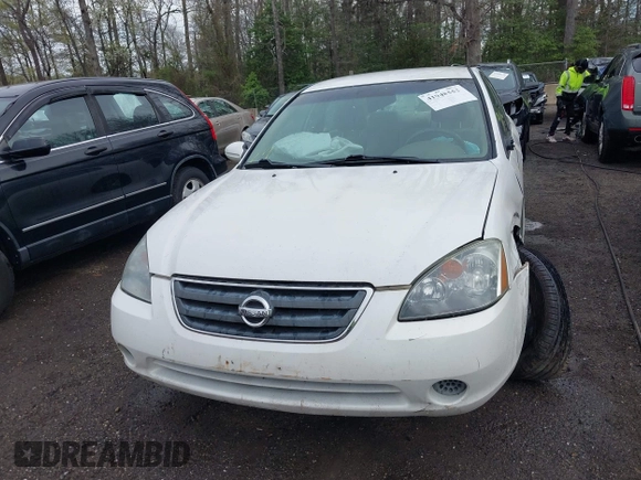 2002 Nissan Altima S with VIN 1N4AL11D72C138368, listed as a IAAI auction lot 41948552 with 242,060 mi miles. Bid and sale history available at carsss.com. Image 12.