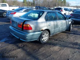 1999 Honda Civic EX with VIN 2HGEJ8643XH511334, listed as a IAAI auction lot 41851364 with 142,632 mi miles. Bid and sale history available at carsss.com. Image 4.
