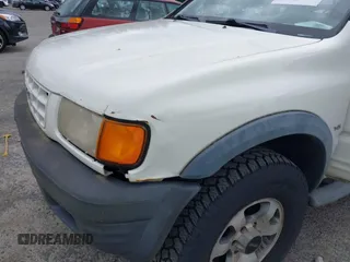 1998 Isuzu Rodeo with VIN 4S2CM57W9W4373049, listed as a IAAI auction lot 42599157 with 140,368 mi miles and . Bid and sale history available at DreamBid. Image 6.