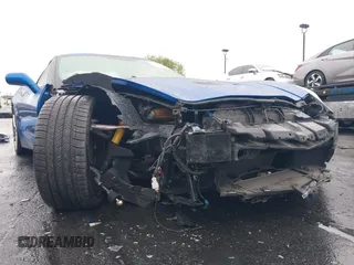 2016 Chevrolet Corvette Z51 3LT z VIN 1G1YM2D74G5116883, wystawiony jako IAAI lot #42160585 z przebiegiem 25 939 mil mil oraz . Historia ofert i sprzedaży dostępna na DreamBid. Obrazek 6.