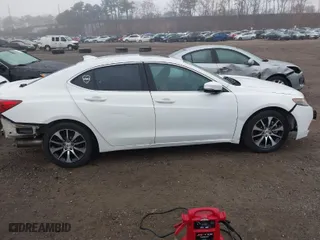 2015 Acura TLX with VIN 19UUB1F30FA017906, listed as a IAAI auction lot 41742441 with 141,150 mi miles. Bid and sale history available at carsss.com. Image 13.