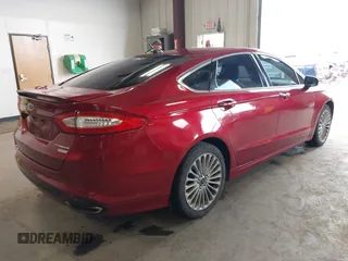 2016 Ford Fusion Titanium z VIN 3FA6P0K95GR119017, wystawiony jako IAAI lot #42148460 z przebiegiem 84 770 mil mil oraz . Historia ofert i sprzedaży dostępna na DreamBid. Obrazek 4.